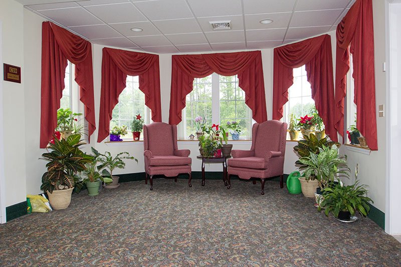 Cozy common area with plants and seating