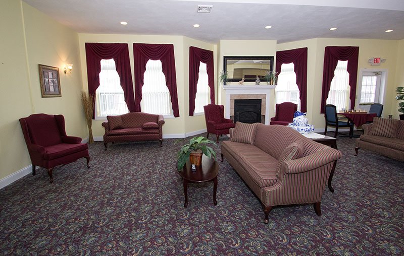 Interior common area with seating and fireplace