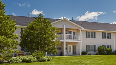 Exterior view of Ashton Place with landscaped grounds