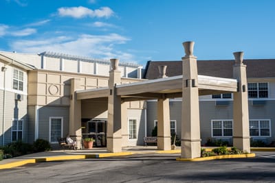 Exterior view of the facility entrance with covered awning