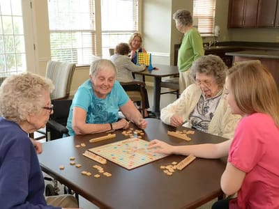 Residents playing games in a community area