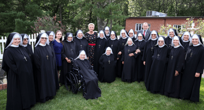 Group photo of Missionary Sisters in a garden
