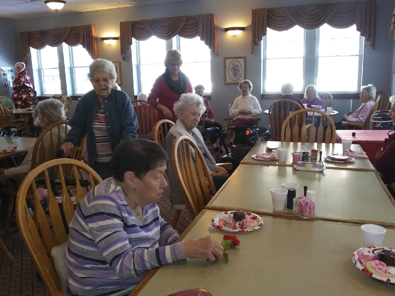 Residents enjoying a meal in the dining room