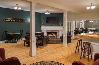 Cozy common area with seating and fireplace