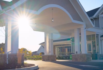 Sun shining through the entrance of a care facility