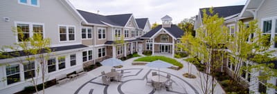 Aerial view of a landscaped courtyard with seating