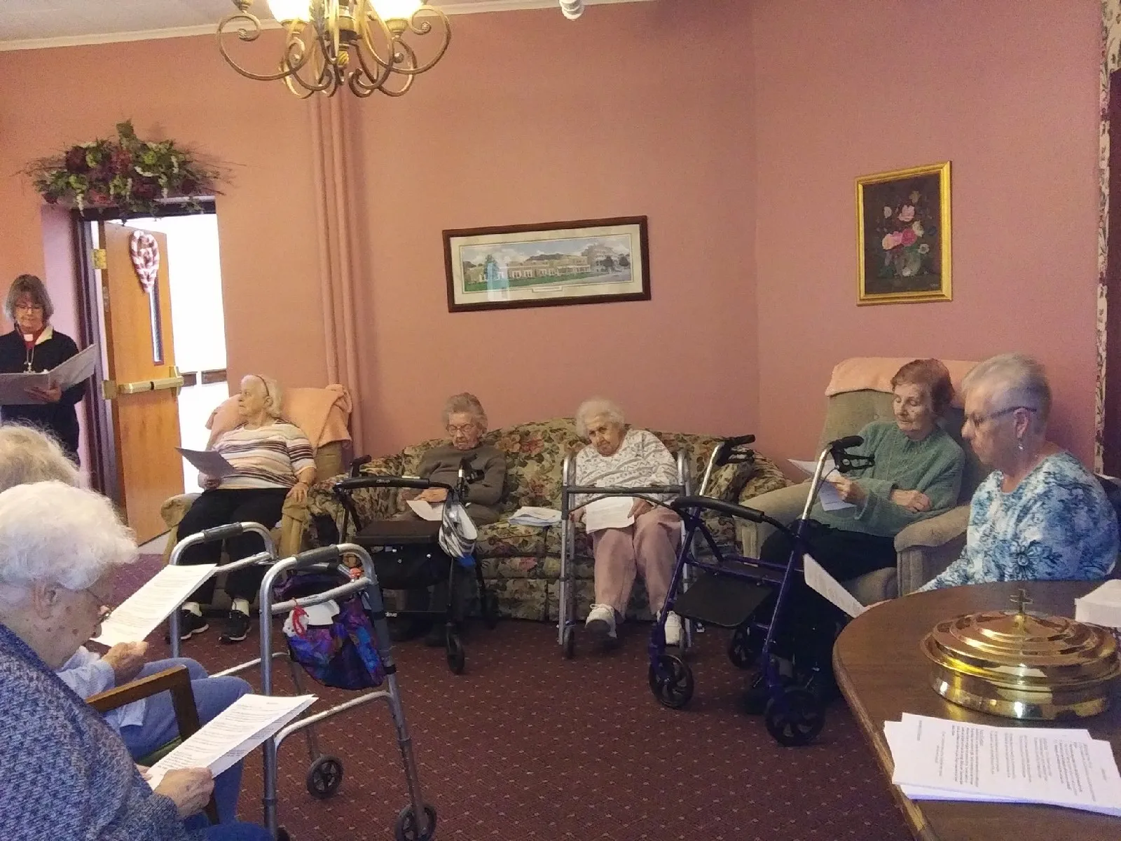Residents participating in a group activity in the common area