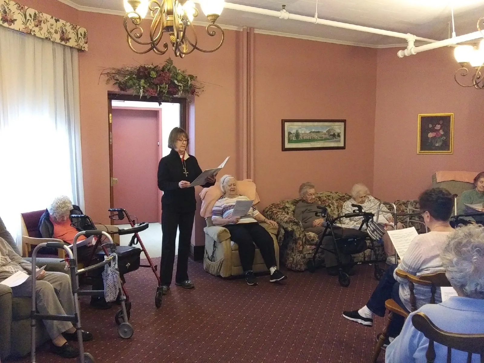 Residents participating in an activity session in a cozy common area