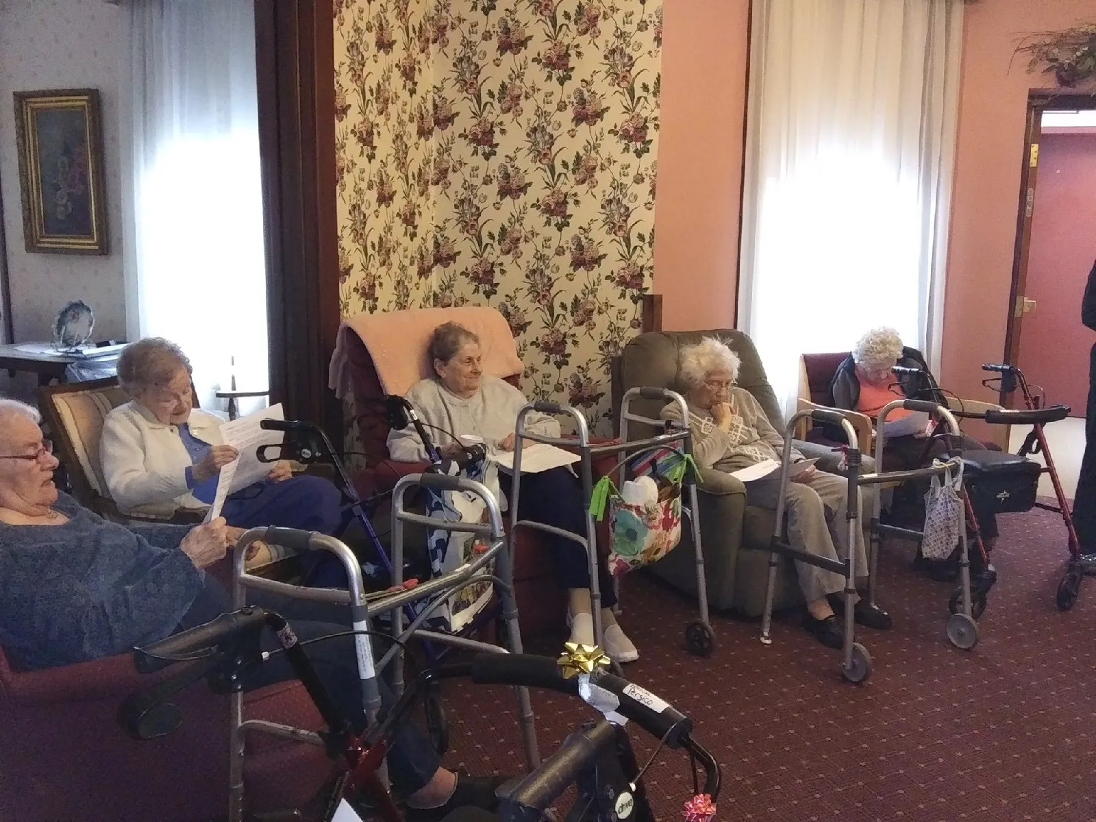 Residents engaged in a quiet activity in a common area