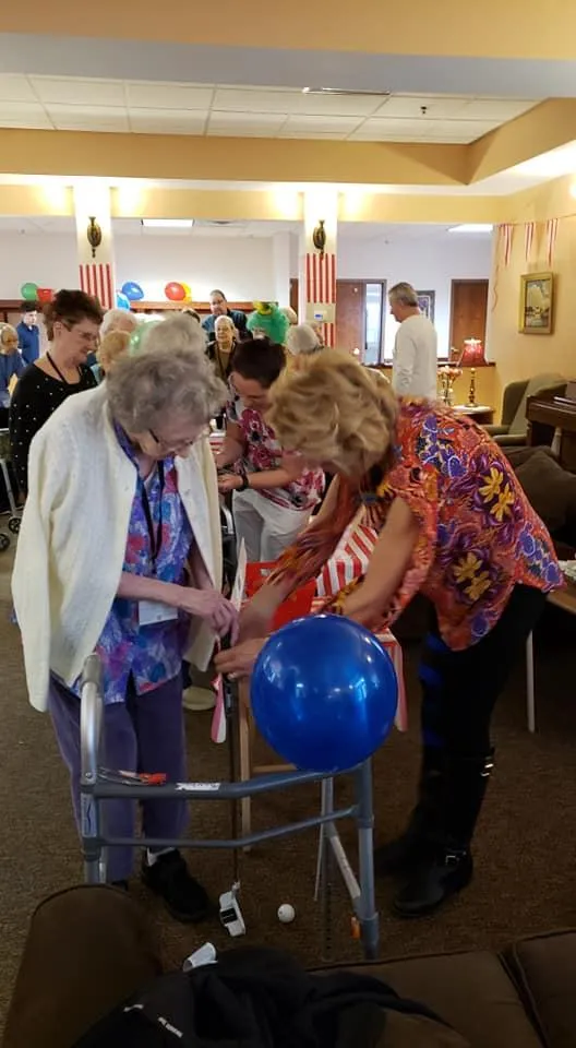 Residents participating in a group activity in the common area