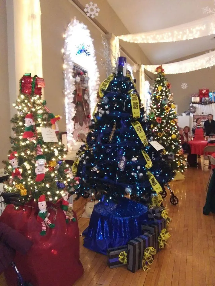 Decorated Christmas trees in a community room