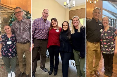 Staff members posing in a common area