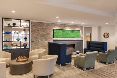 Interior seating area with modern decor and fireplace