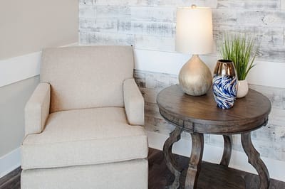 Cozy corner of an interior with a chair and table