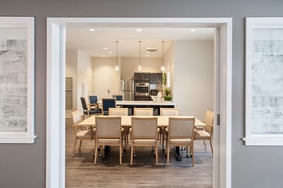 Bright dining room with large table and modern decor