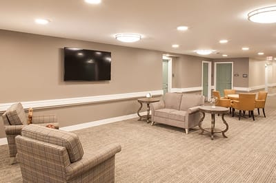 Common area with seating and television