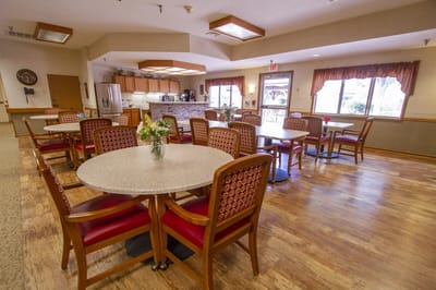 Bright dining room with tables and chairs