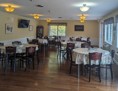 Dining area with tables set for meals