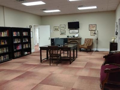 Interior view of a common area with bookshelves