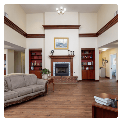 Common area with seating and fireplace