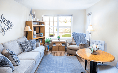 Bright, inviting living area with comfortable seating