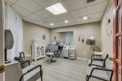 Interior view of a salon room in an assisted living facility