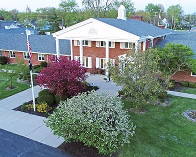 Exterior view of Lochhaven facility with landscaped gardens