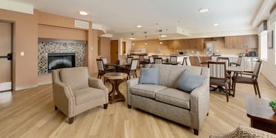 Interior common area with seating and kitchen