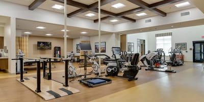 Interior of a fitness room with various gym equipment