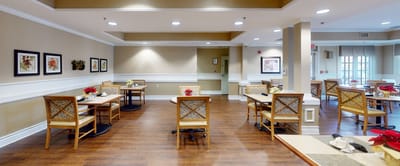 Bright dining room with tables and chairs