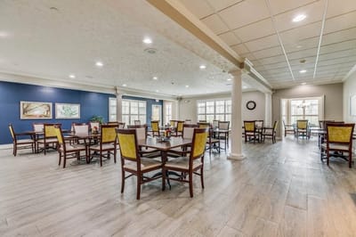 Bright dining room with tables and chairs