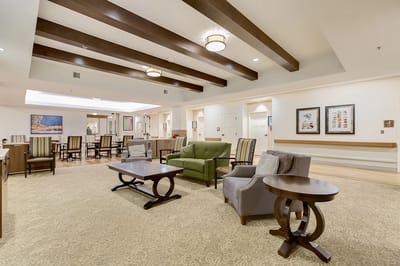 Bright common area with seating and decor