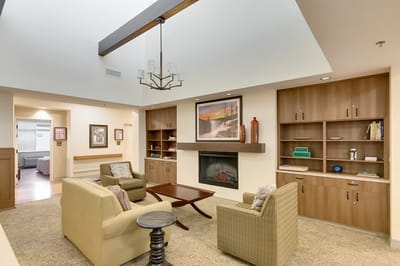 Cozy common area with comfortable seating and a fireplace