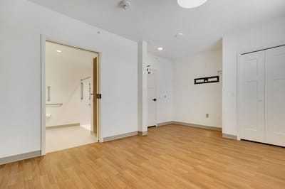 Bright interior view of a private resident room