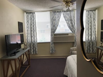 Cozy interior view of a resident room with large window