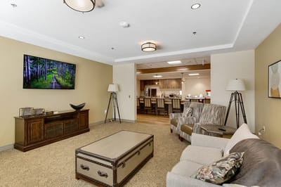 Interior common area with seating and TV
