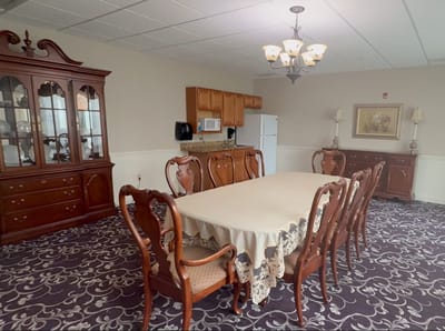 Interior dining room with a large table and chairs