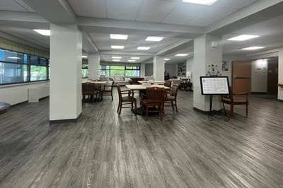 Bright interior common area with tables and chairs