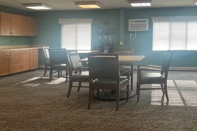 Bright common area with tables and chairs