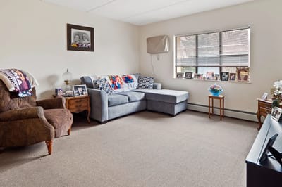 Cozy living room with personal photos and decor