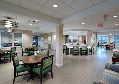 Bright common area with tables and seating
