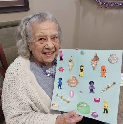 Resident engaged in an arts and crafts activity