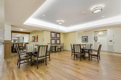 Bright common area with seating and artwork