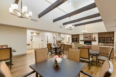 Bright common area with tables and chairs