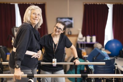 Residents engaged in physical therapy session