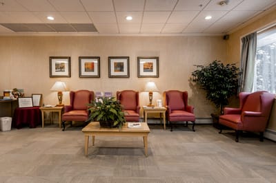 Common area with seating and decorative artwork