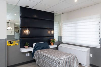 Private resident room with bed and decorations