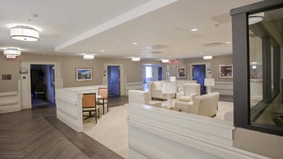 Bright common area with seating and artwork