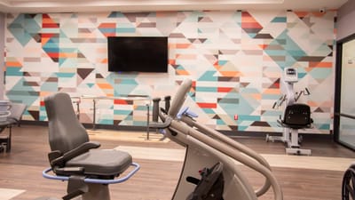 Interior view of a fitness area with exercise equipment