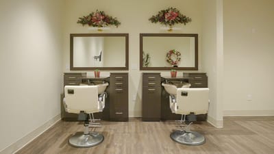 Salon area with stylish hairdressing stations